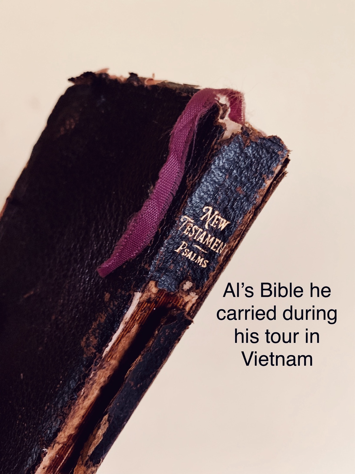 The heavily worn pocket New Testament and Psalms carried by Al Loomis during his tour in Vietnam