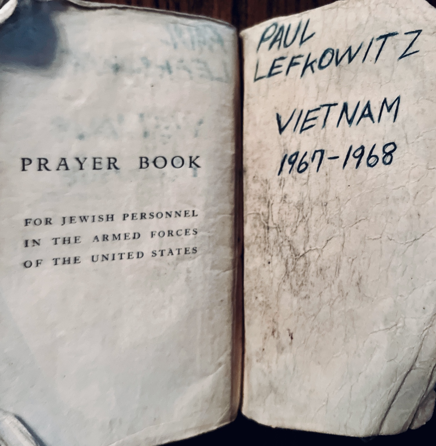 A worn Jewish Armed Forces prayer book inscribed Paul Lefkowitz, Vietnam, 1967–1968
