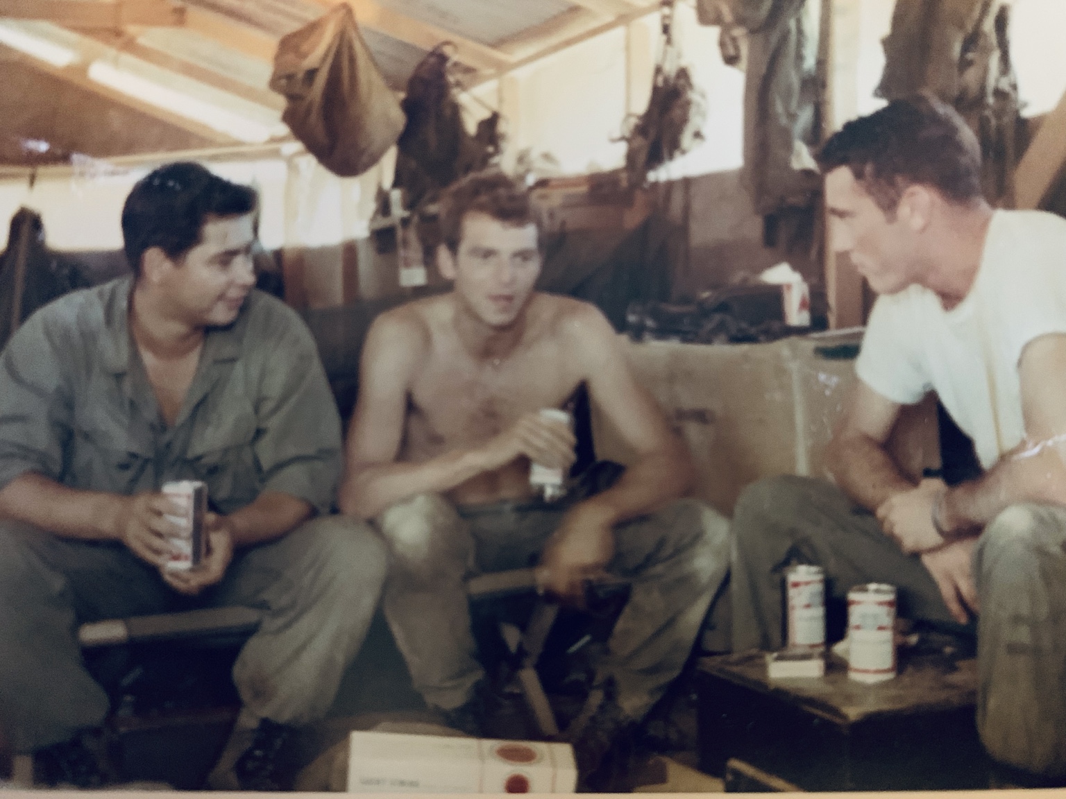 From left: David “Indian” Printup, Al Loomis, and Cecil Smith sharing a quiet moment in their quarters. 2nd Platoon, 1967 or 1968.