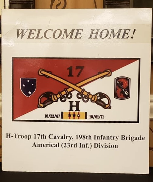 Welcome Home display honoring H Troop, 17th Cavalry, with crossed cavalry sabers and service dates