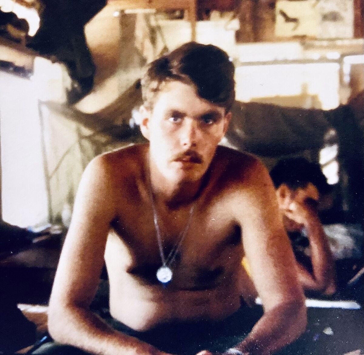 An unidentified trooper seated inside shared quarters