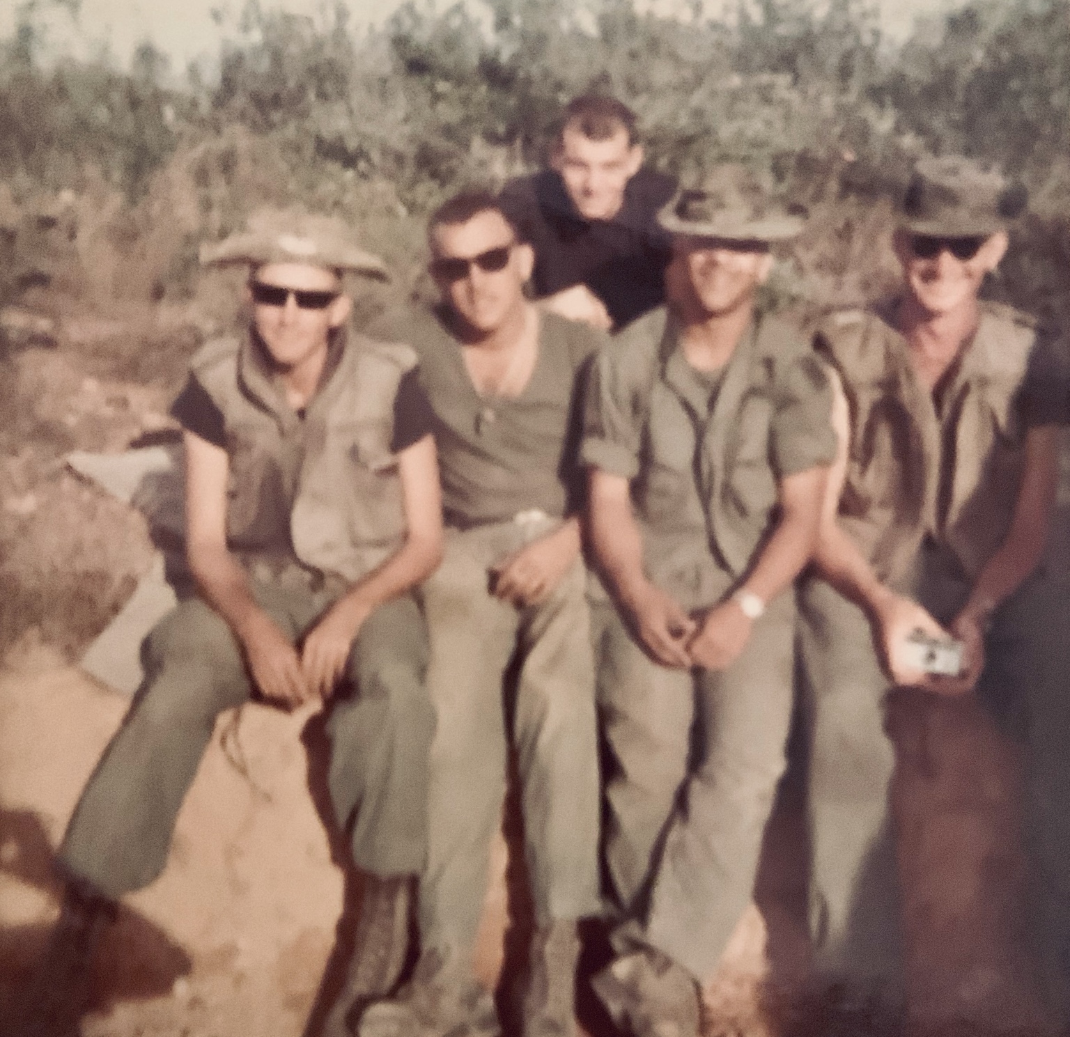 2nd Platoon troopers sharing a break, circa 1968: Joe Laughery, one unidentified trooper, Al Loomis in the black T-shirt in back, Pete “Chico” Garcia, and Sgt. Ramon Vega.